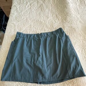 RBX active skort. Skirt style with shorts liner. Pretty teal color.